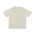 A light beige short-sleeve crewneck t-shirt with a small MaisonMary logo printed in black on the center chest, accompanied by a tiny yellow flower graphic. 