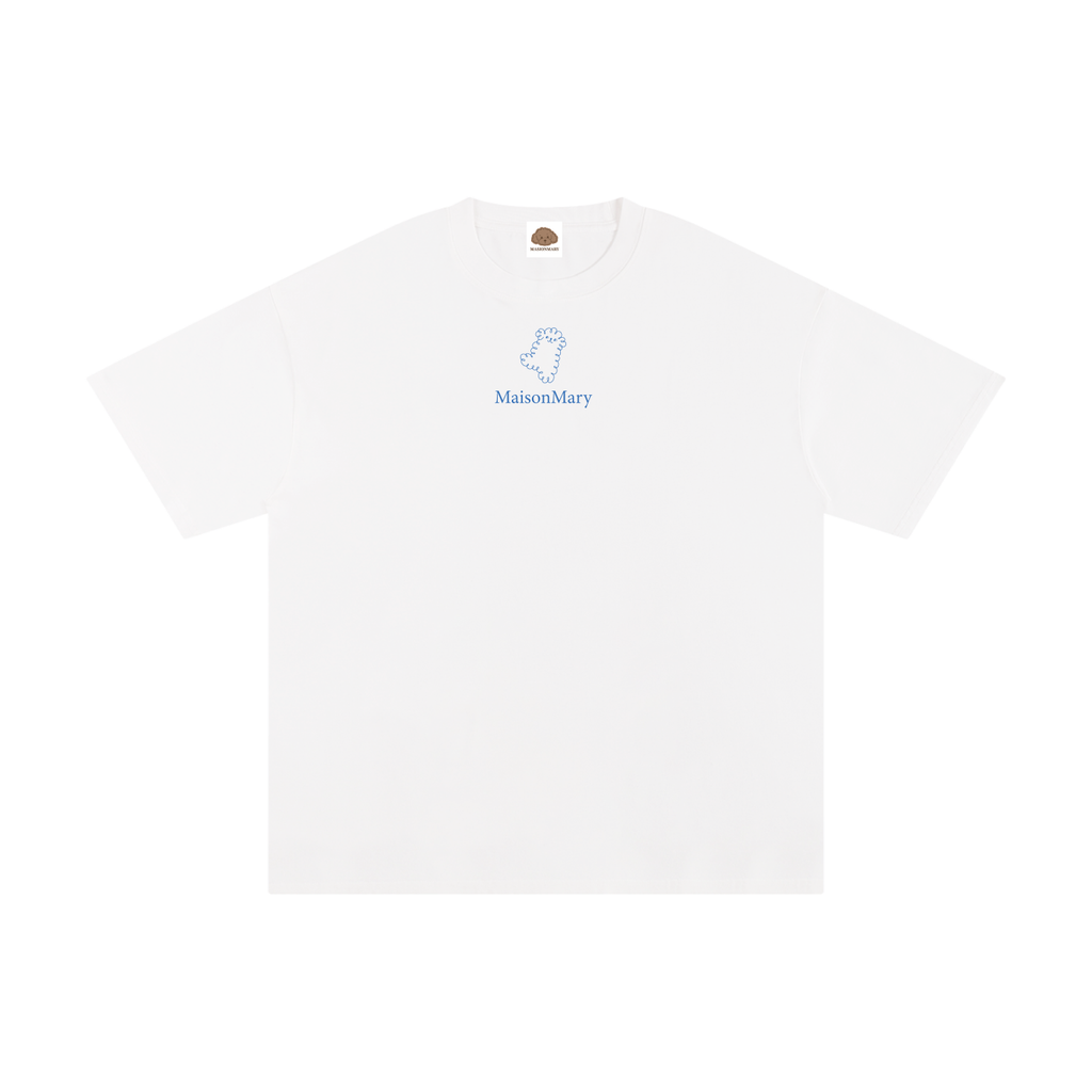 Three models shown from the back wearing white t-shirts with a blue graphic print on the back. The graphic features the text 'MAISON MAONY' and a line drawing of dogs